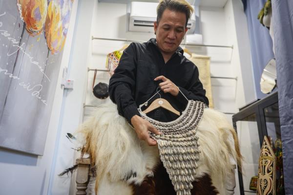 Fashion designer Gilbert Francis Untam shows the Iban Warrior Shirt, Gagong, made of leather and fur when spotted at the Gilbert Headhunter clothing boutique @G&Co in Seri Kembangan September 9, 2023. — Bernama pic