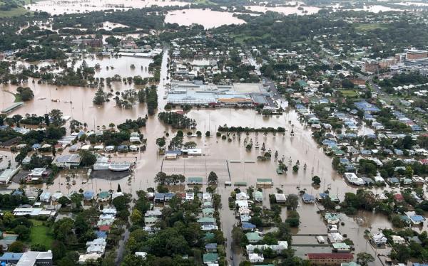 A handout photo taken and received on March 31, 2022 from the New South Wales (NSW) State Emergency Service shows floodwaters inundating the northern NSW city of Lismore. (Photo by Handout / NEW SOUTH WALES STATE EMERGENCY SERVICE / AFP) / ----EDITORS NOTE ----RESTRICTED TO EDITORIAL USE MANDATORY CREDIT 