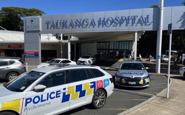 Armed police at Tauranga Hospital amid lockdown over threat on 21 March 2024.