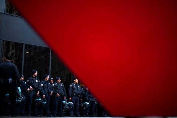 New York police officers stand guard as protesters march demanding a ceasefire and the end of Israeli attacks on Gaza, during the o<em></em>ngoing co<em></em>nflict between Israel and the Palestinian Islamist group Hamas, in New York City, U.S., March 19, 2024. 