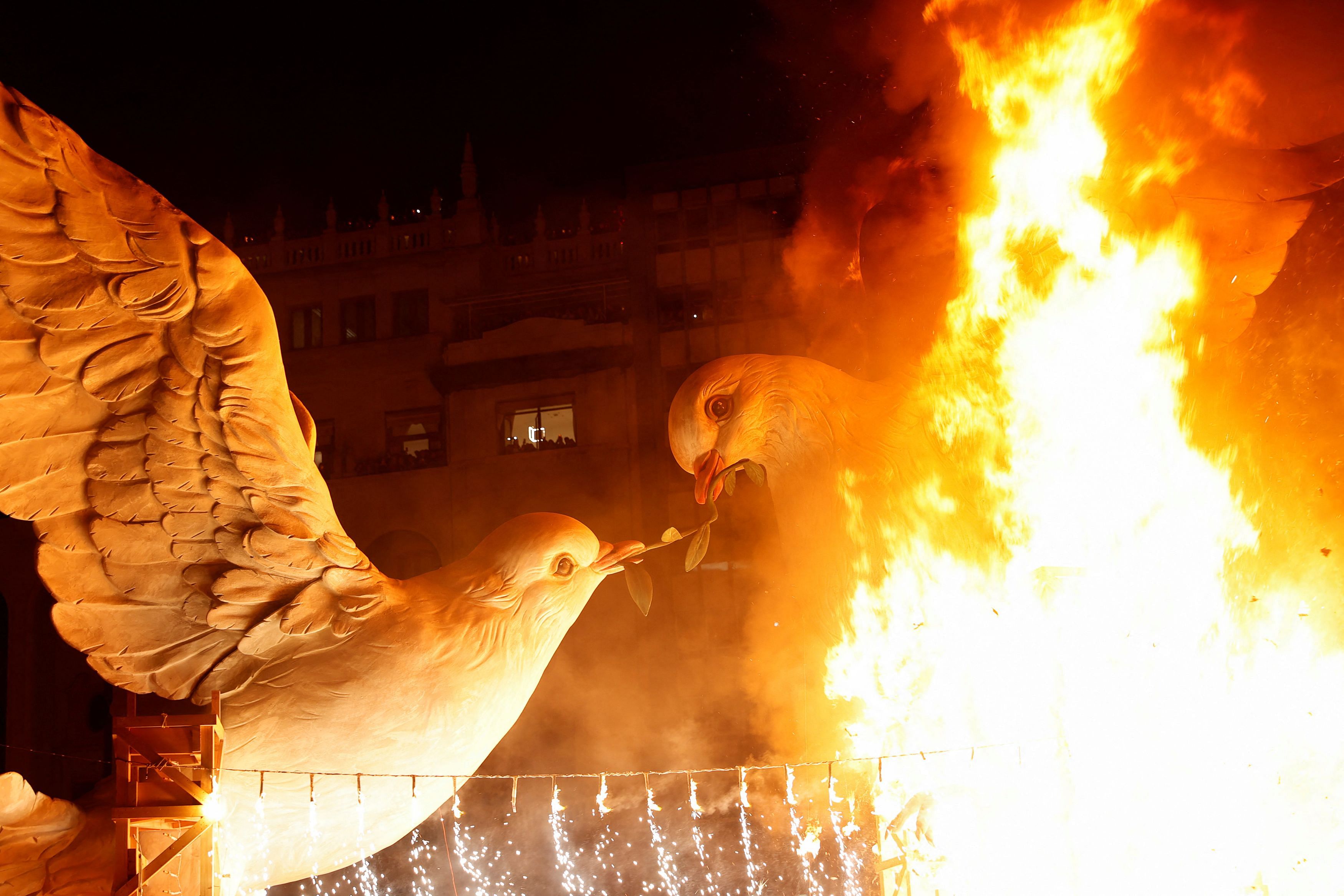 A giant sculpture is burned on the last day of Fallas Festival in Valencia, Spain, March 19, 2024. 