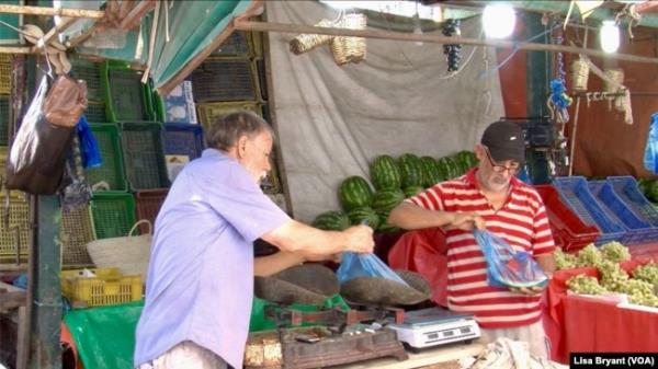 Fruit sellers in Tunis. Five years of drought have sent the price of produce soaring.