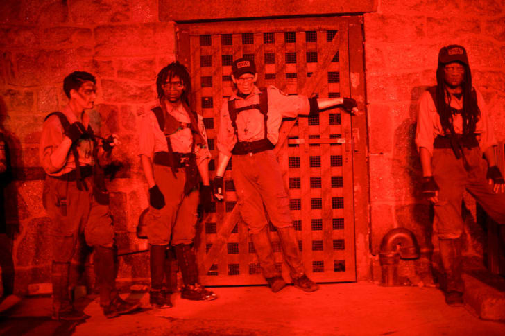 Performers waiting to scare visitors at Eastern State Penitentiary.