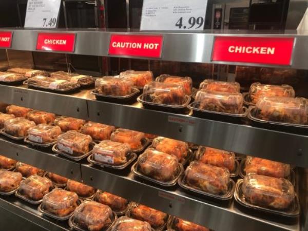 Los Angeles, CA/USA 11/25/2019 Kirkland brand seaso<em></em>ned rotisserie chickens for sale at a Costco Mega Discount Store