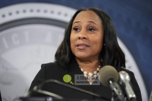 FILE - Fulton County District Attorney Fani Willis speaks in the Fulton County Government Center during a news conference, Monday, Aug. 14, 2023, in Atlanta. Do<em></em>nald Trump and several allies have been indicted in Georgia over efforts to overturn his 2020 election loss in the state. (AP Photo/John Bazemore, File)