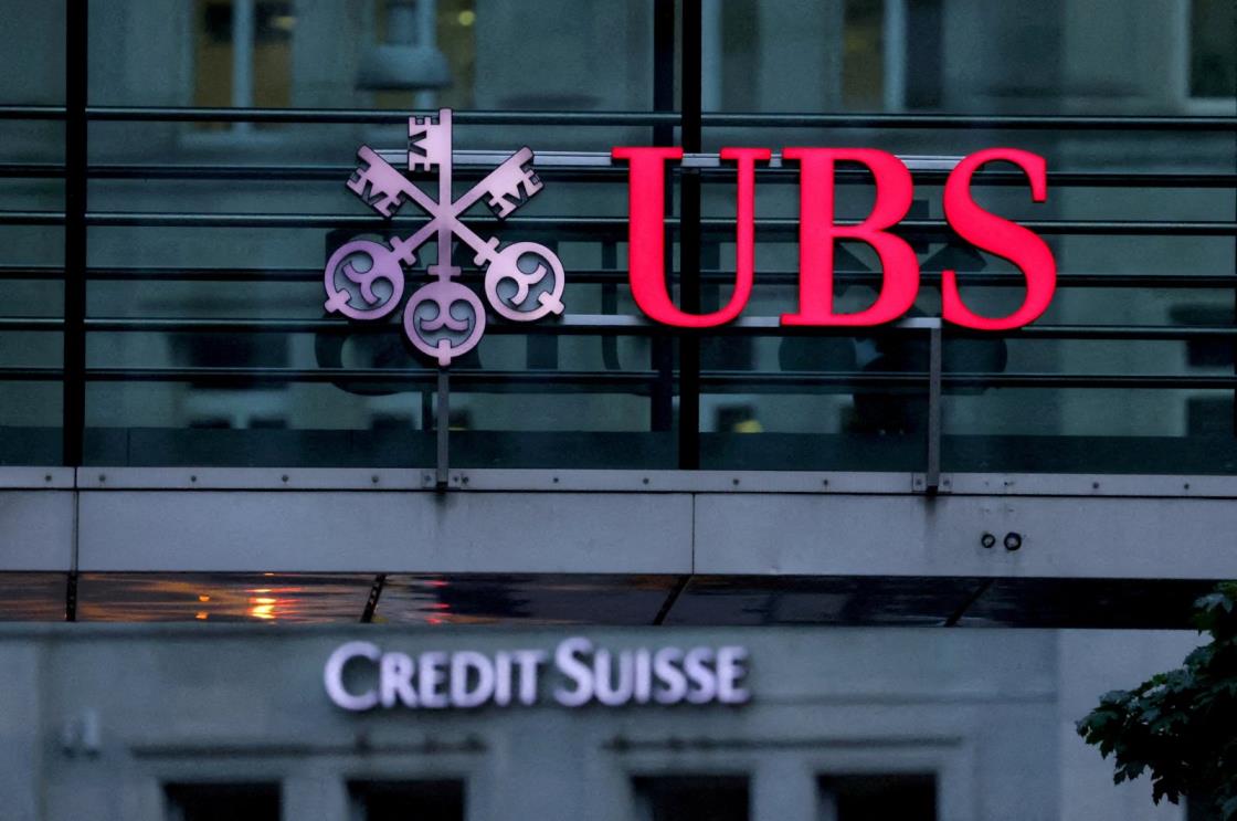 Logos of Swiss banks Credit Suisse and UBS are seen before a news co<em></em>nference in Zurich, Switzerland, Aug. 30, 2023. (Reuters Photo)