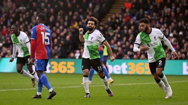 Mo Salah celebrates his double century