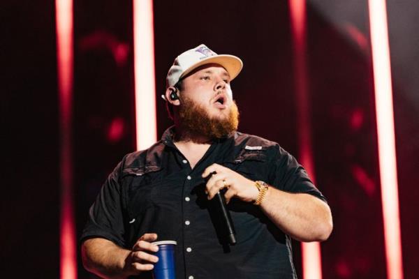 Luke Combs says he was sickened to learn one of his fans was ordered to pay $250,000 for making homemade drink tumblers featuring his image.