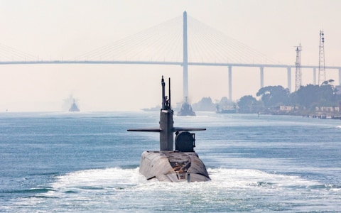 US submarine Florida inbound via the Suez Canal to the trouble zone with her cargo of Tomahawk missiles and Navy SEAL frogman-commandos. Sometimes even subs get spotted