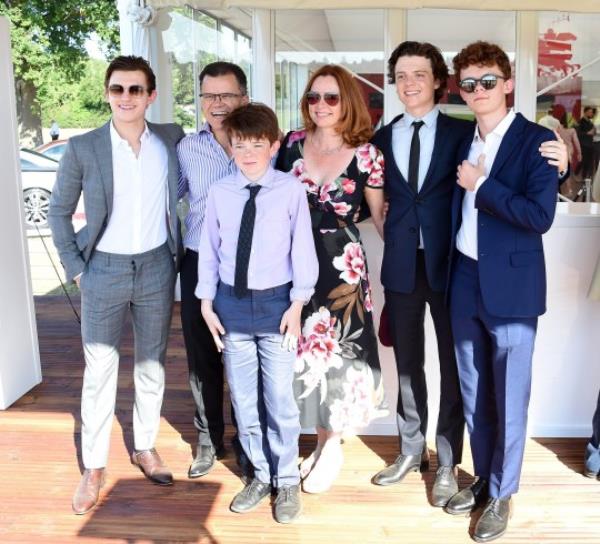 Tom and Dominic Holland with family