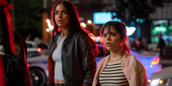 Jenna Ortega as Tara and Melissa Barrera as Samantha look at something off-screen horrified in Scream VI