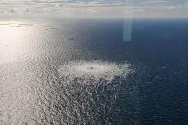 Gas leak at Nord Stream 2 as seen from the Danish F-16 interceptor on Bornholm, Denmark September 27, 2022. Danish Defence Command/Forsvaret Ritzau Scanpix/via REUTERS ATTENTION EDITORS - THIS IMAGE WAS PROVIDED BY A THIRD PARTY. DENMARK OUT. NO COMMERCIAL OR EDITORIAL SALES IN DENMARK.