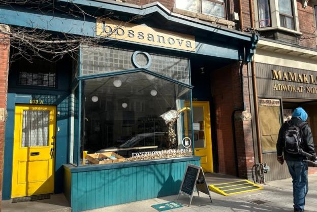 Exterior of bar and bottle shop with sign that says 'bossanova' 