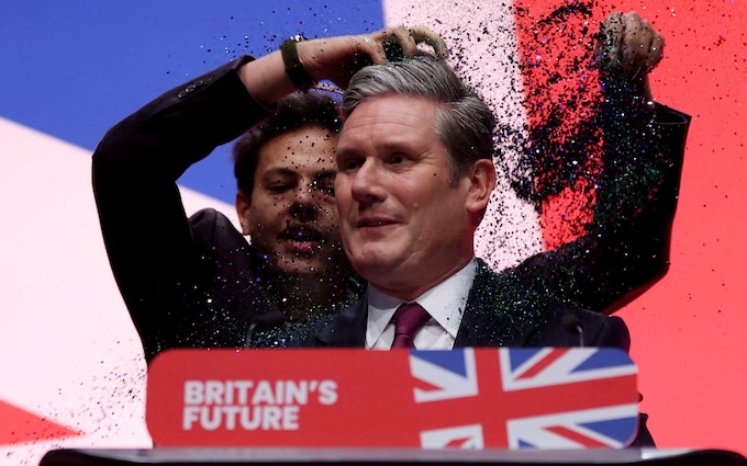 Activist Yaz Ashmawi stormed the stage while shouting a<em></em>bout voting reform and threw glitter at Keir Starmer