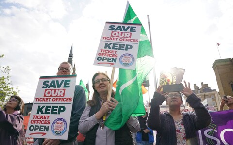 A rally outside King's Cross station, in London, over planned ticket office closures