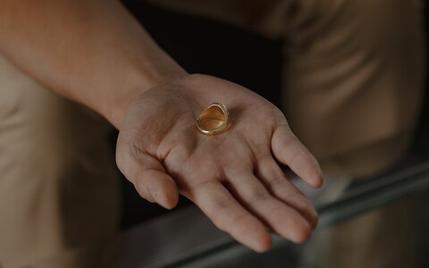 Jo<em></em>nathan Scott-Lee holds the ring in memory of his daughter