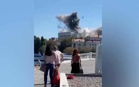 Local people watch a Storm Shadow missile strike on Sevastopol