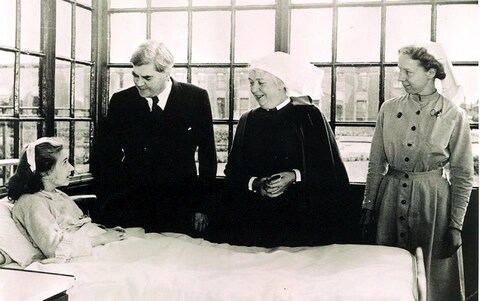 Aneurin Bevan talking to the NHS's first patient, Sylvia Diggory, at Trafford General, Manchester, in 1948