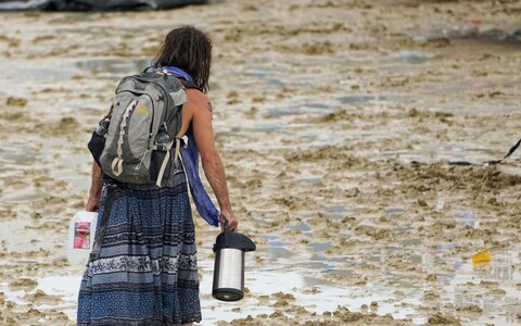 A Burning Man attendee stuck in the mud