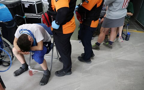 A youngster waits at the hospital as safety co<em></em>ncerns mount  over the heatwave conditions