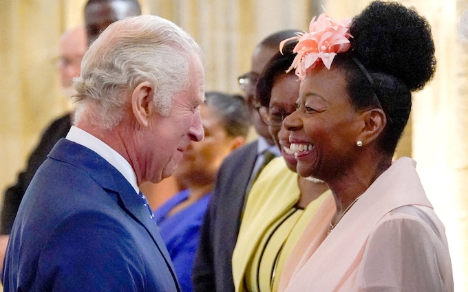 King Charles III speaks with Baro<em></em>ness Dame Floella Benjamin, following a service  to recognise and celebrate the Windrush 75th Anniversary 