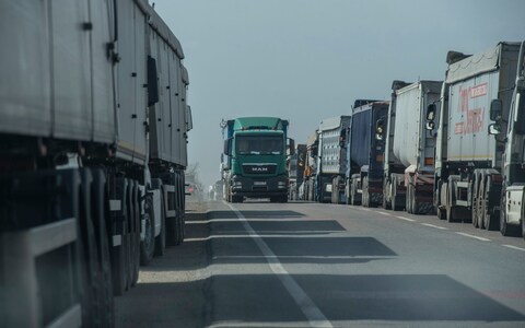  Izmail Port on the Danube River Delta in Odessa Oblast. Trucks, mostly carrying grain, queue on the road leading to Izmail