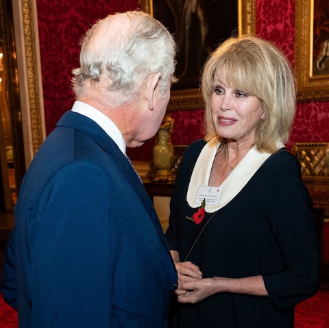 The King meets Dame Joanna Lumley at a reception at Buckingham Palace