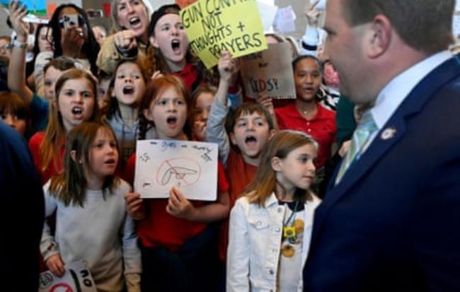 Students shout at state lawmakers as they demo<em></em>nstrate against gun violence in Nashville during a March for Our Lives walkout on 3 April.