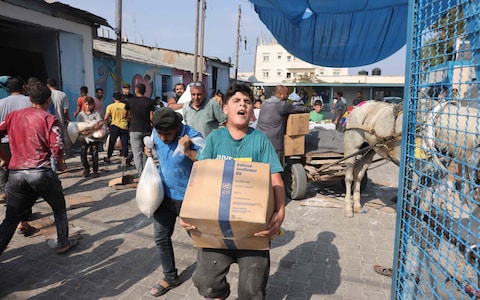 People break into aid warehouses in Gaza