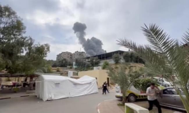 A screen grab from a video shows smoke rising after Israeli airstrikes on the Indo<em></em>nesian hospital in the Jabalia neighbourhood of Gaza City on Sunday.