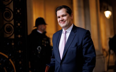 Robert Jenrick, the immigration minister, is pictured yesterday arriving in Downing Street