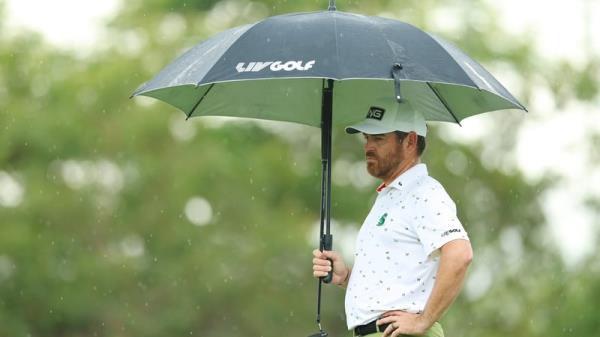 Louis Oosthuizen and Charl Schwartzel are tied heading into Monday