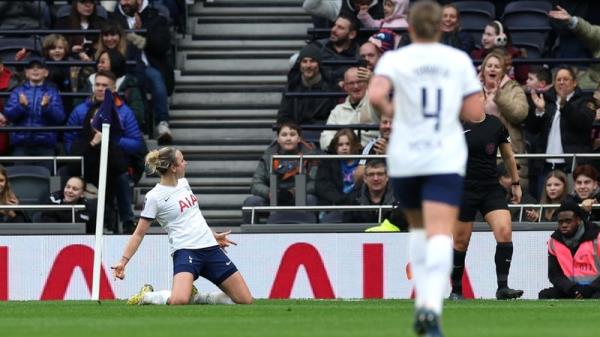 Martha Thomas celebrates after scoring the Spurs goal