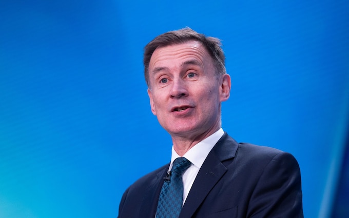 Britain's Chancellor of the Exchequer Jeremy Hunt