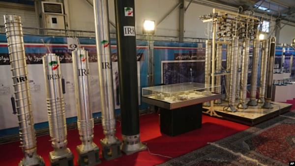 FILE - Iran's domestically built centrifuges are displayed in an exhibition of the country's nuclear achievements, in Tehran, Iran, Feb. 8, 2023.