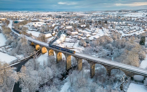 A train crosses the Viaduct in Stewarton, Ayrshire