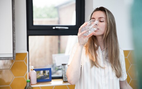 Girl drink glass of water 