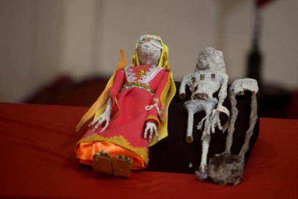 Tiny bodies of a specimen are displayed, as according to studies by Peru's Institute of Legal Medicine, these 'Alien mummies' are dolls made with animal bones, in Lima, Peru, January 12, 2024. REUTERS/Sebastian Castaneda