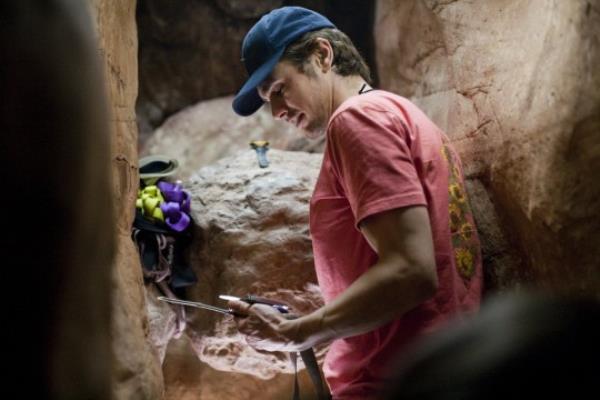 FILM: 127 Hours (2010) with James Franco as Aron Ralston.