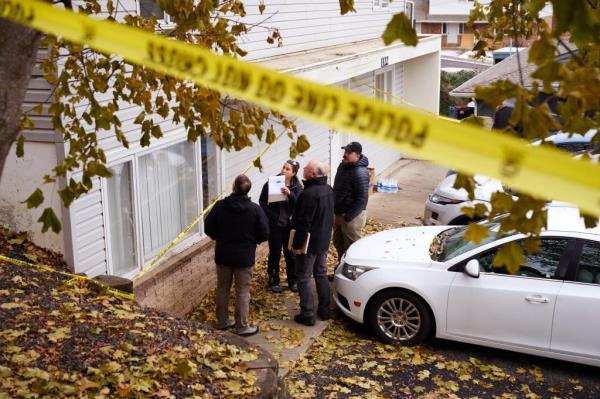 Investigators examine the off-campus home wher<em></em>e four University of Idaho students were stabbed to death on Nov. 25, 2022 in Moscow, Idaho. 