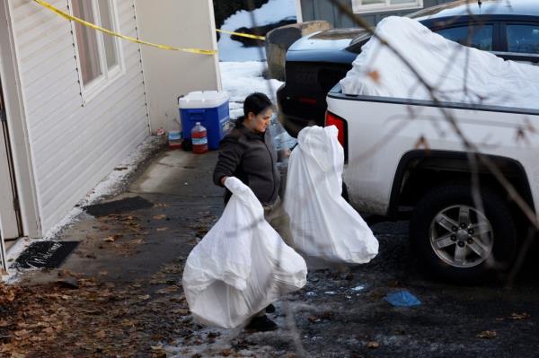 Police and forensics units came to remove bedding, blood-stained mattresses, furniture and perso<em></em>nal effects from 1122 King Road in Moscow, ID — wher<em></em>e the four University of Idaho students were killed. 