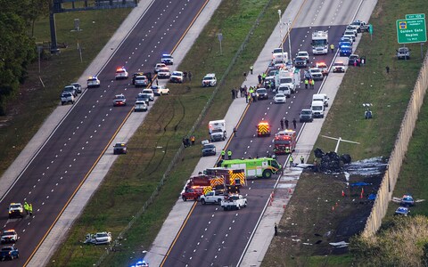 The flight came down on Interstate 75 near the small city of Naples and struck a car and a pickup truck