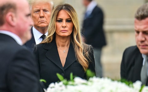 A grief-stricken Melania said her final goodbye