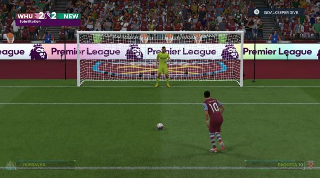 Player begins run-up to take penalty shot against goalkeeper in EA Sports FC 24.