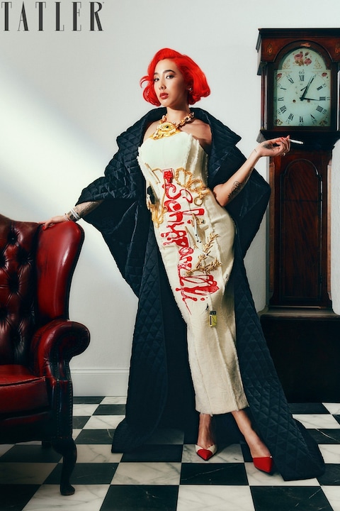 Lady Venetia Baring, daughter of the 4th Earl of Cromer, posing with cigarette for Tatler's March issue