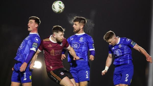 Waterford's Ryan Burke heads clear while under pressure from Galway United's Karl O'Sullivan