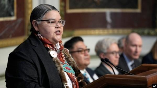 Corrine Sams of the Co<em></em>nfederated Tribes of the Umatilla Indians speaks during a ceremony in Washington, Feb. 23, 2024. The Biden administration, four tribes and two governors launched a plan to help salmon populations recover in the Pacific Northwest.