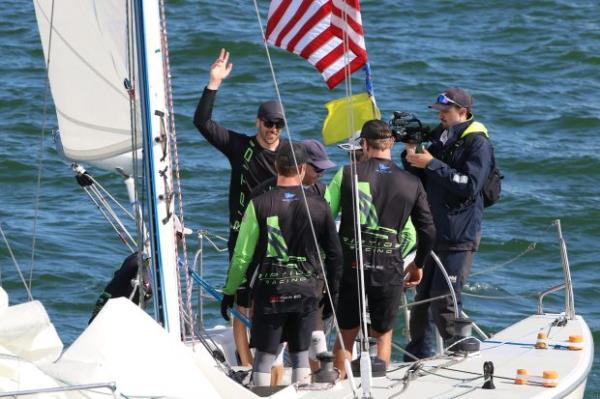 American Chris Poole waves to spectators after winning his second...