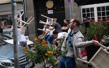 Fighting breaks out between what appears to be England and Serbia fans