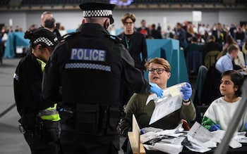 Police enter the count at the city's Emirates Arena